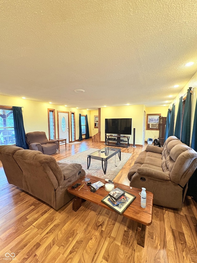 404 S Indiana St, Roachdale, IN 46172 - living room featuring a textured ceiling and wood finished floors