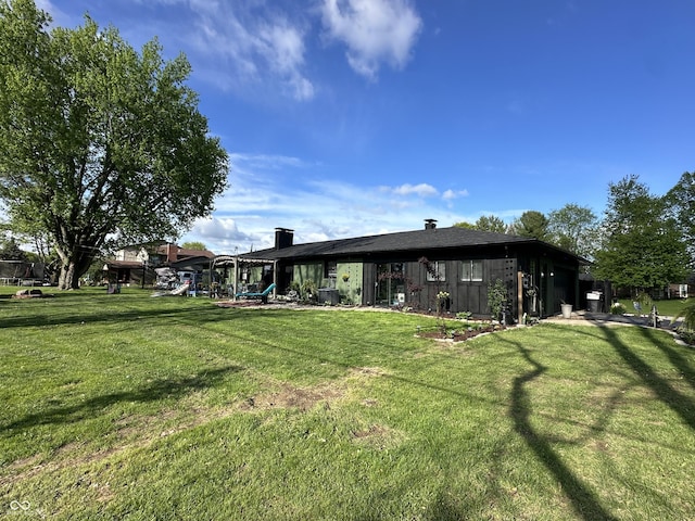 2028 Fairway Dr, Greencastle, IN 46135 - rear view of property with a yard and a playground
