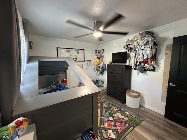 2028 Fairway Dr, Greencastle, IN 46135 - bedroom with wood finished floors, a ceiling fan, and baseboards