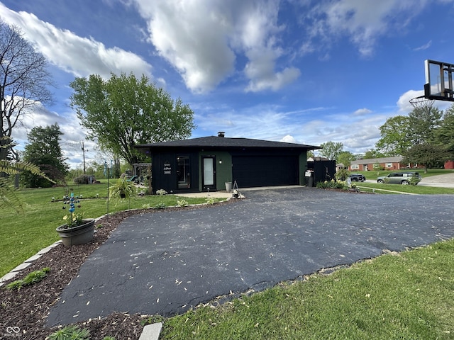 2028 Fairway Dr, Greencastle, IN 46135 - view of front of house featuring a front yard, driveway, and an attached garage
