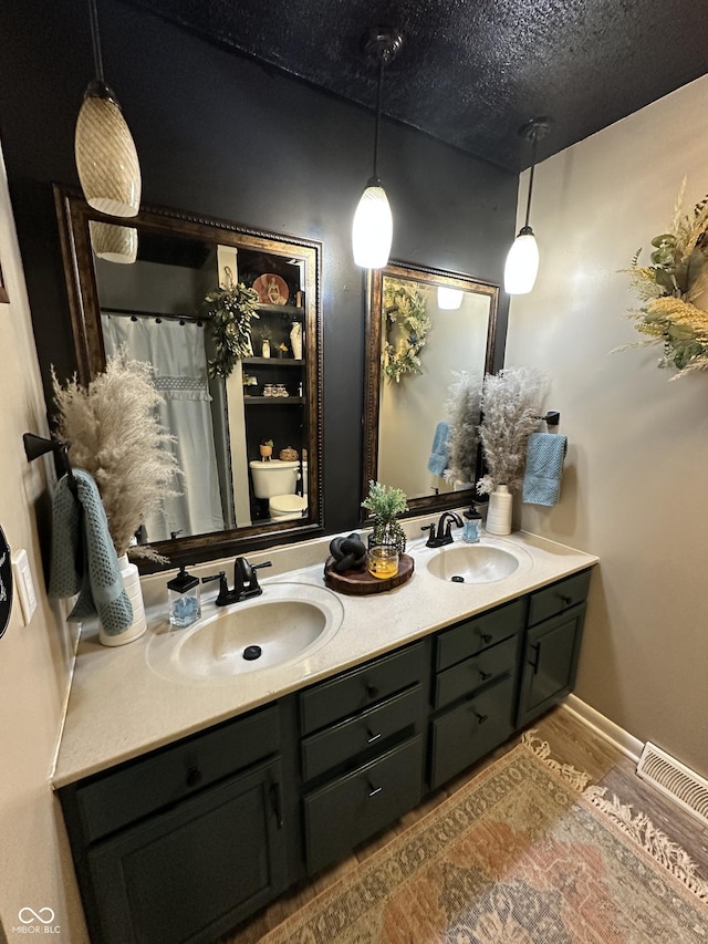 2028 Fairway Dr, Greencastle, IN 46135 - full bathroom featuring double vanity and toilet