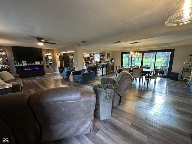 2028 Fairway Dr, Greencastle, IN 46135 - living area featuring a chandelier, wood finished floors, and a ceiling fan