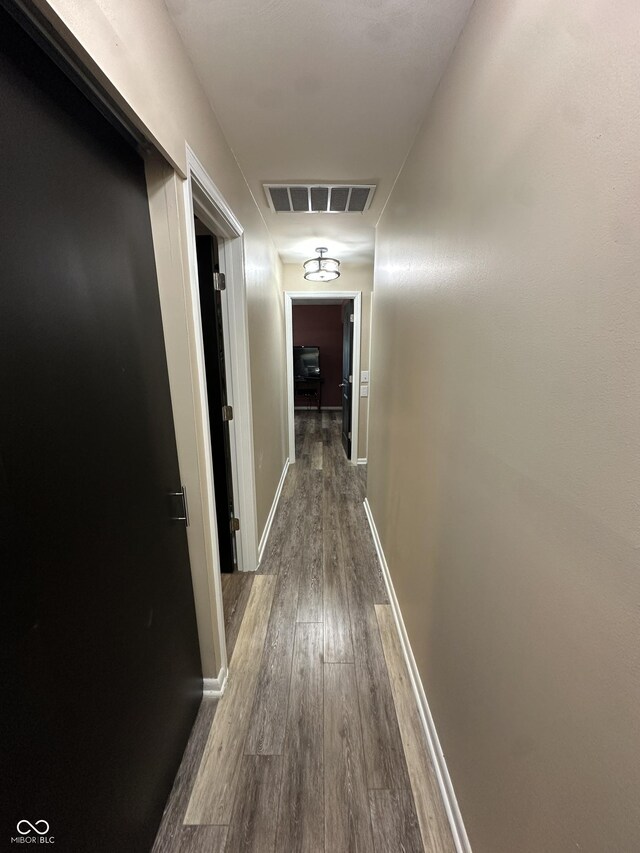 2028 Fairway Dr, Greencastle, IN 46135 - hallway featuring dark wood-type flooring and baseboards