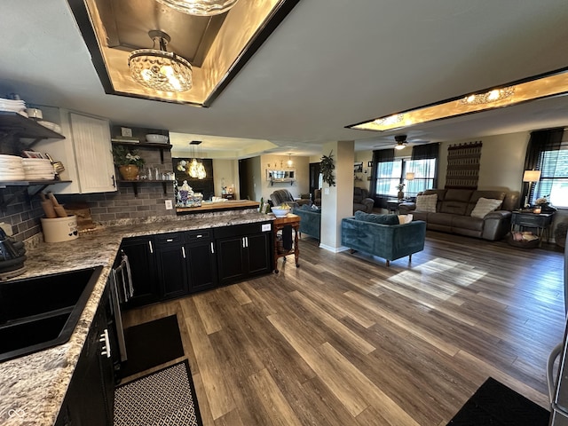2028 Fairway Dr, Greencastle, IN 46135 - kitchen with open shelves, open floor plan, healthy amount of natural light, and a peninsula