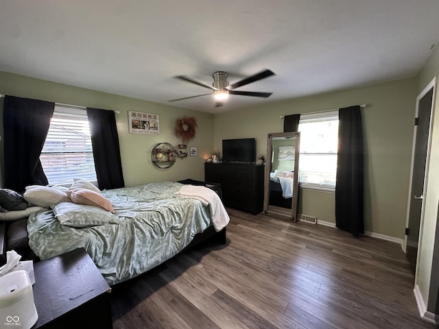 2028 Fairway Dr, Greencastle, IN 46135 - bedroom featuring wood finished floors, baseboards, and a ceiling fan