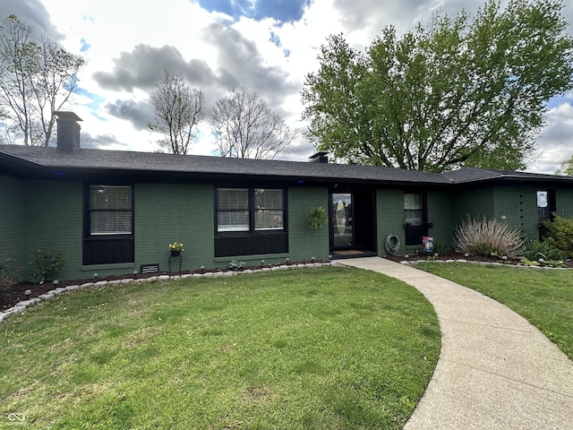 2028 Fairway Dr, Greencastle, IN 46135 - ranch-style house with brick siding, a front yard, and a chimney