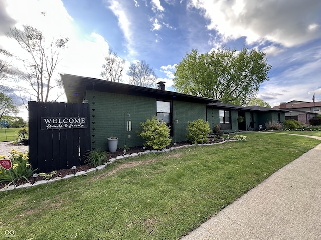 2028 Fairway Dr, Greencastle, IN 46135 - view of front of home with brick siding and a front yard