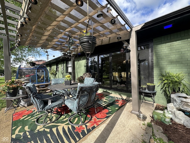 2028 Fairway Dr, Greencastle, IN 46135 - view of patio with a pergola, a trampoline, and outdoor dining space