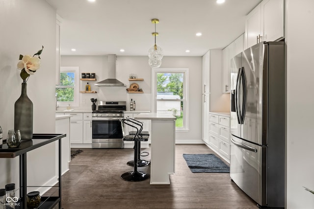 3526 Westfield Dr, Anderson, IN 46011 - kitchen featuring appliances with stainless steel finishes, wall chimney exhaust hood, open shelves, white cabinetry, and plenty of natural light