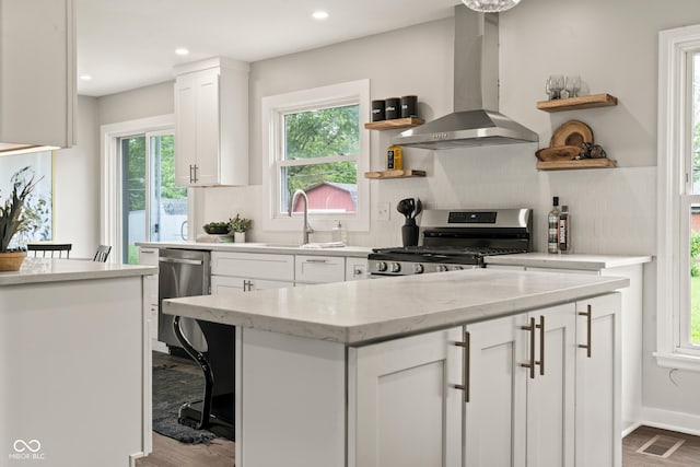 3526 Westfield Dr, Anderson, IN 46011 - kitchen featuring wall chimney range hood, open shelves, stainless steel appliances, white cabinets, and backsplash