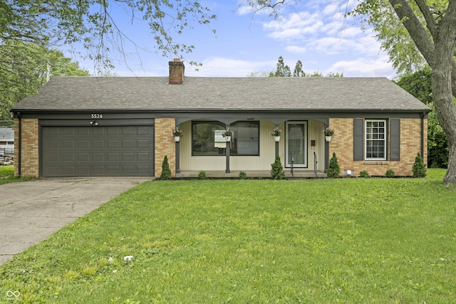 3526 Westfield Dr, Anderson, IN 46011 - ranch-style house featuring a chimney, a garage, brick siding, concrete driveway, and a front yard