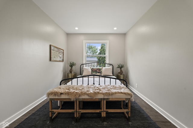 3526 Westfield Dr, Anderson, IN 46011 - bedroom with baseboards, dark wood-type flooring, and recessed lighting