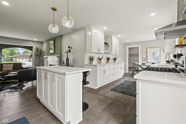 3526 Westfield Dr, Anderson, IN 46011 - kitchen featuring open shelves, white cabinets, dark wood-type flooring, recessed lighting, and decorative light fixtures