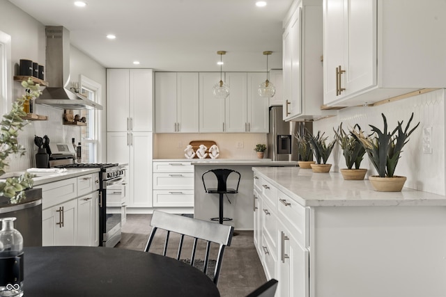 3526 Westfield Dr, Anderson, IN 46011 - kitchen featuring stainless steel appliances, ventilation hood, white cabinets, and recessed lighting