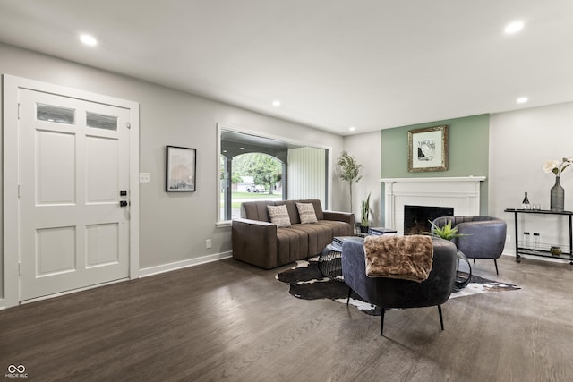 3526 Westfield Dr, Anderson, IN 46011 - living area featuring a brick fireplace, wood finished floors, recessed lighting, and baseboards