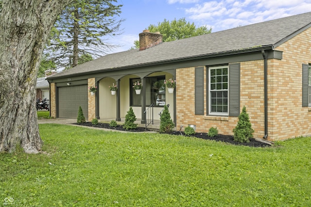 3526 Westfield Dr, Anderson, IN 46011 - single story home with a chimney, brick siding, a front lawn, and a garage