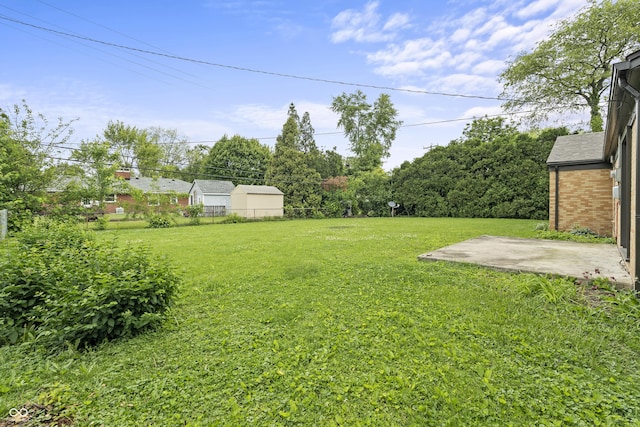 3526 Westfield Dr, Anderson, IN 46011 - view of green lawn with a patio area