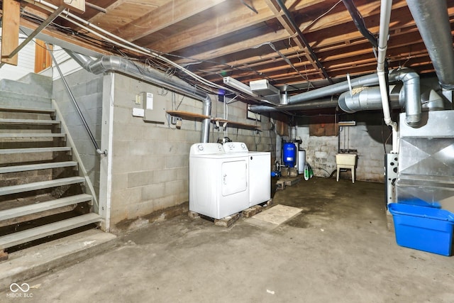 6012 S 625 W, Pendleton, IN 46064 - unfinished basement featuring separate washer and dryer, a water pressure tank, and stairs