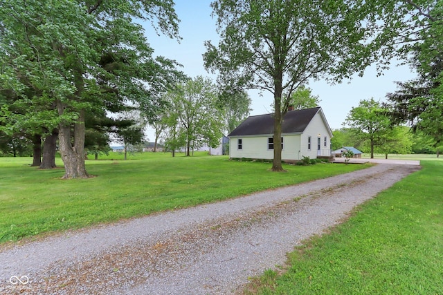 6012 S 625 W, Pendleton, IN 46064 - view of side of property with gravel driveway and a lawn