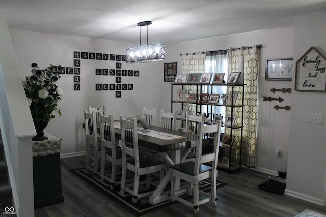 5101 W Bay Rd, Plainfield, IN 46168 - dining room featuring wood finished floors, a chandelier, and baseboards