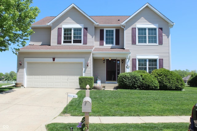 5101 W Bay Rd, Plainfield, IN 46168 - view of front of home featuring an attached garage, a front yard, driveway, and a shingled roof