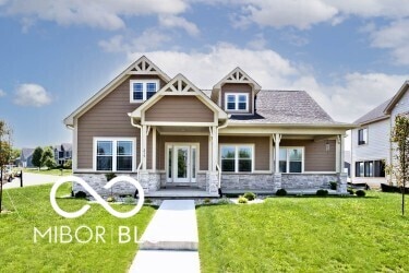 217 N Liberty Blvd, Mooresville, IN 46158 - view of front of home featuring a front yard and stone siding