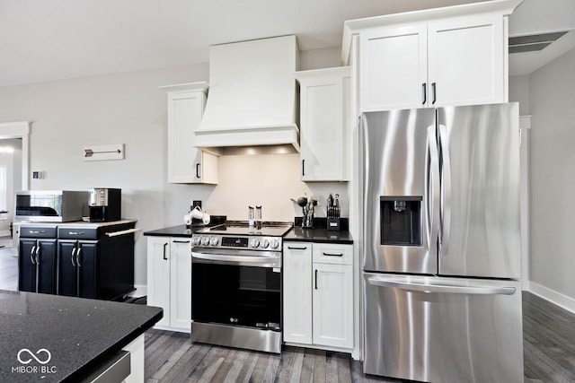 217 N Liberty Blvd, Mooresville, IN 46158 - kitchen featuring stainless steel appliances, premium range hood, dark wood-style flooring, and white cabinetry