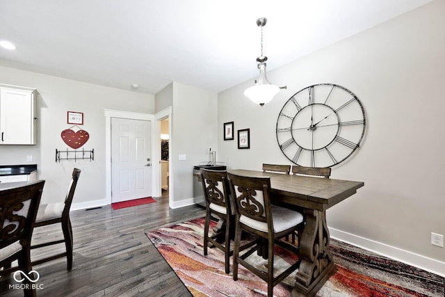 217 N Liberty Blvd, Mooresville, IN 46158 - dining area featuring baseboards and dark wood-type flooring
