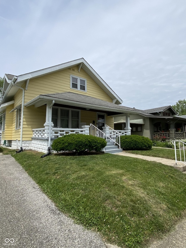 536 S 27th St, Lafayette, IN 47904 - view of front facade featuring a porch and a front lawn