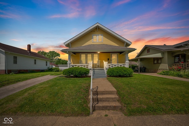 536 S 27th St, Lafayette, IN 47904 - view of front of house with a porch and a front lawn