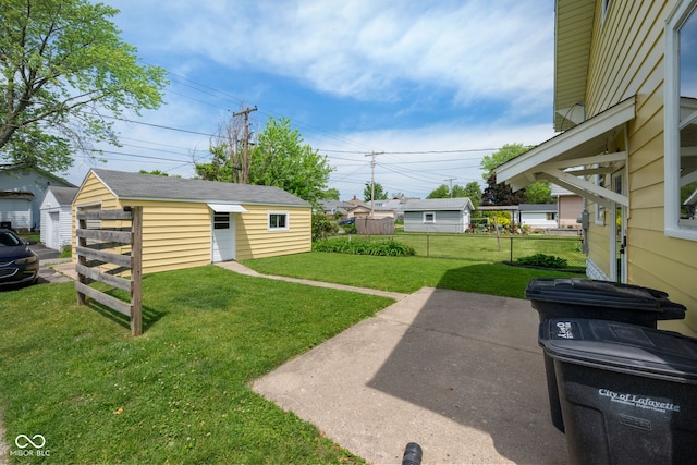 536 S 27th St, Lafayette, IN 47904 - view of yard with a patio area and an outbuilding