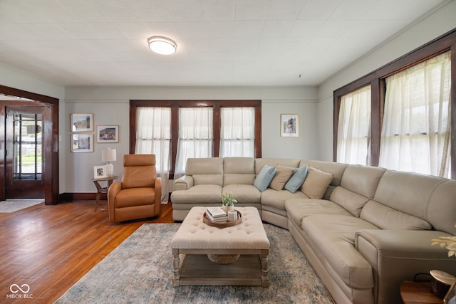 536 S 27th St, Lafayette, IN 47904 - living area with wood finished floors, plenty of natural light, and baseboards