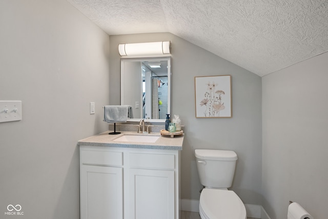 536 S 27th St, Lafayette, IN 47904 - bathroom featuring toilet, a textured ceiling, lofted ceiling, and vanity