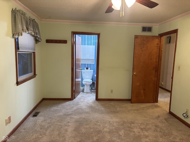 505 N Edward Dr, Greensburg, IN 47240 - empty room with carpet flooring, ceiling fan, ornamental molding, a textured ceiling, and baseboards