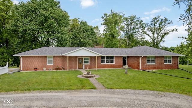 7441 State Road 60 W, Mitchell, IN 47446 - ranch-style home with a front lawn, brick siding, and a shingled roof