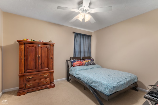 3638 Fieldstone Ln, Plainfield, IN 46168 - bedroom featuring light carpet, baseboards, and ceiling fan