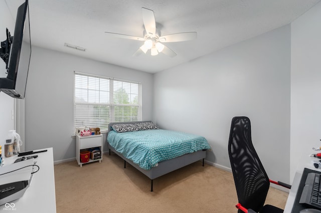 3638 Fieldstone Ln, Plainfield, IN 46168 - bedroom with light carpet, baseboards, and ceiling fan