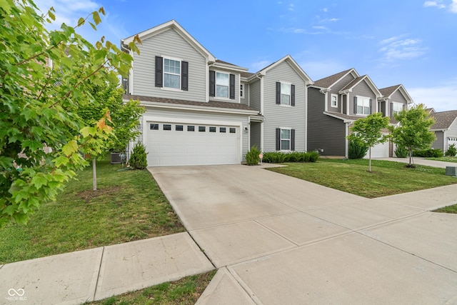918 Cass Dr, Franklin, IN 46131 - traditional-style home featuring a garage, driveway, a front yard, and cooling unit