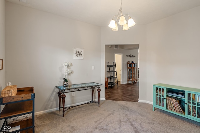 918 Cass Dr, Franklin, IN 46131 - hall featuring carpet flooring, a chandelier, and baseboards
