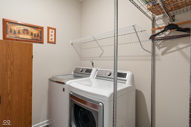 918 Cass Dr, Franklin, IN 46131 - washroom featuring washer and clothes dryer and baseboards