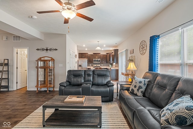 918 Cass Dr, Franklin, IN 46131 - living area with dark wood-type flooring, a ceiling fan, and baseboards