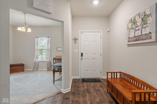 918 Cass Dr, Franklin, IN 46131 - entrance foyer featuring a chandelier, dark wood-style floors, and baseboards