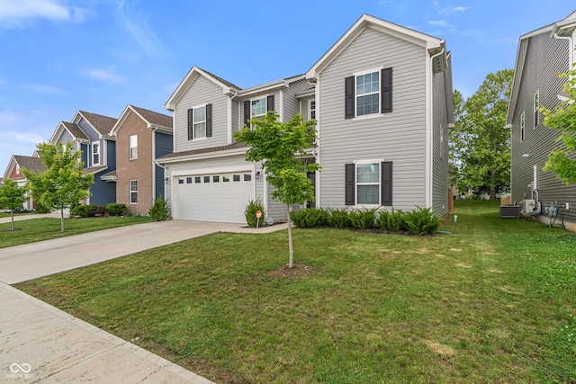 918 Cass Dr, Franklin, IN 46131 - traditional-style house with concrete driveway, an attached garage, a front lawn, and central air condition unit