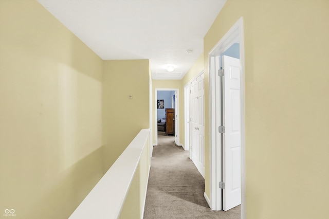 2623 Senators Way, Indianapolis, IN 46217 - corridor with carpet floors, attic access, and baseboards