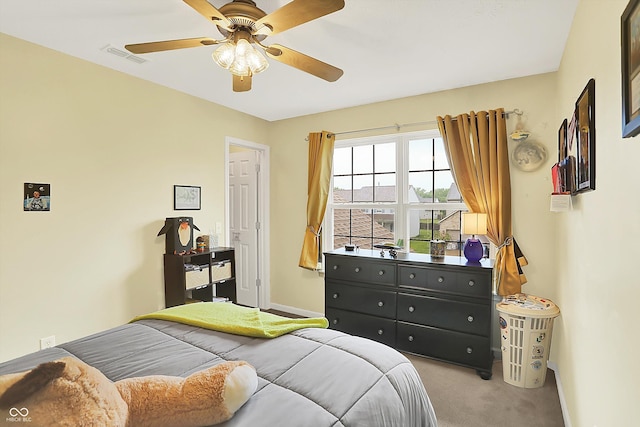 2623 Senators Way, Indianapolis, IN 46217 - bedroom with carpet floors, baseboards, and ceiling fan