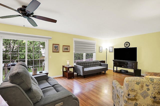 2623 Senators Way, Indianapolis, IN 46217 - living room featuring ceiling fan, wood finished floors, and baseboards
