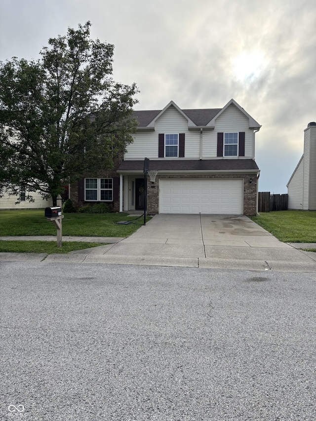2730 Foxbriar Pl, Indianapolis, IN 46203 - traditional-style home featuring concrete driveway, a garage, and brick siding