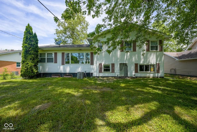 2721 W 34th St, Anderson, IN 46011 - split level home featuring a front lawn and central AC