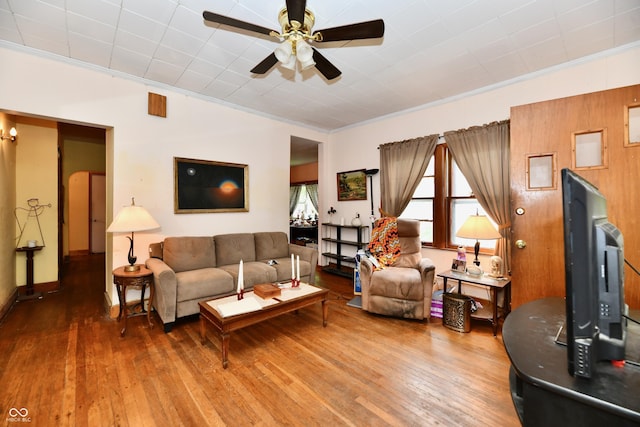 1106 W 4th St, Anderson, IN 46016 - living area with a ceiling fan, hardwood / wood-style flooring, and crown molding