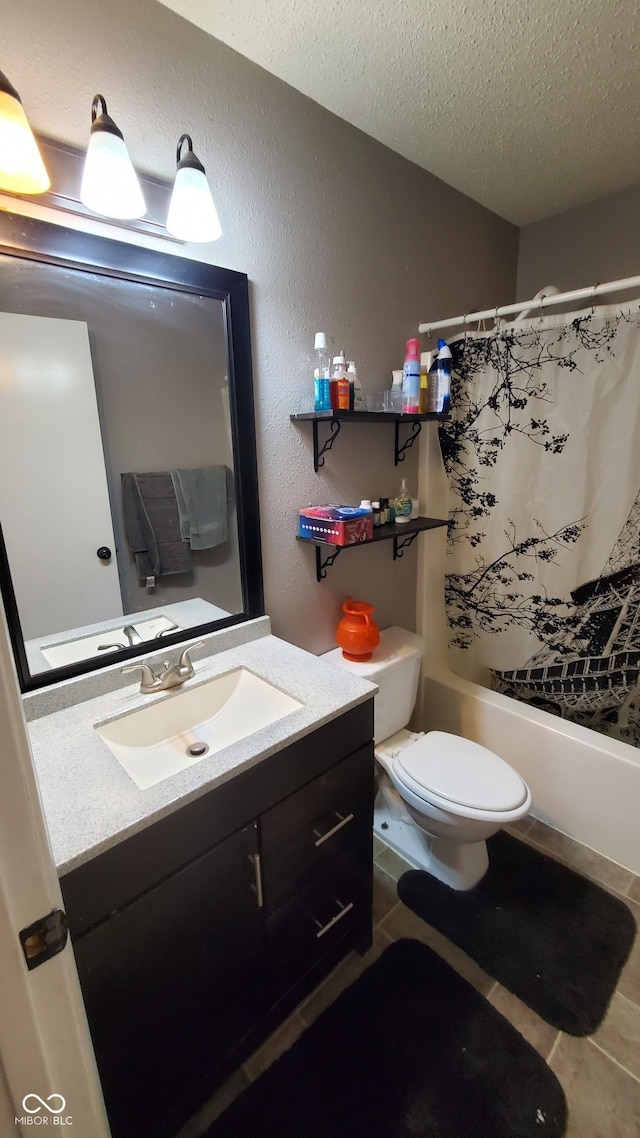 6637 Larkwood Ct, Indianapolis, IN 46241 - bathroom featuring a textured ceiling, vanity, toilet, shower / bath combination with curtain, and tile patterned floors